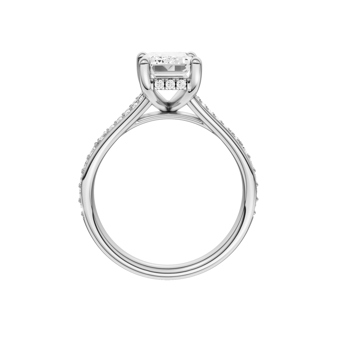 A profile view of the Emerald cut diamond engagement ring in 14k white gold with a diamond channel band and split setting
