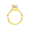 A profile view of the Emerald cut diamond engagement ring in 14k yellow gold with a diamond channel band and split setting