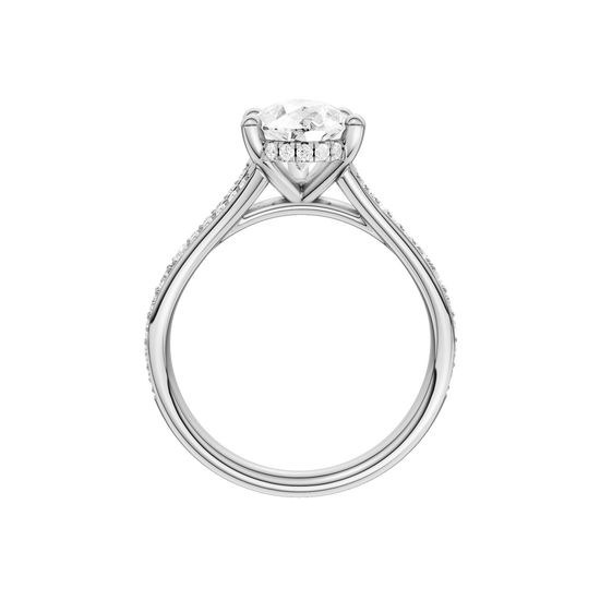 A profile view of the Pear cut diamond engagement ring in 14k white gold with a channel band and cathedral setting