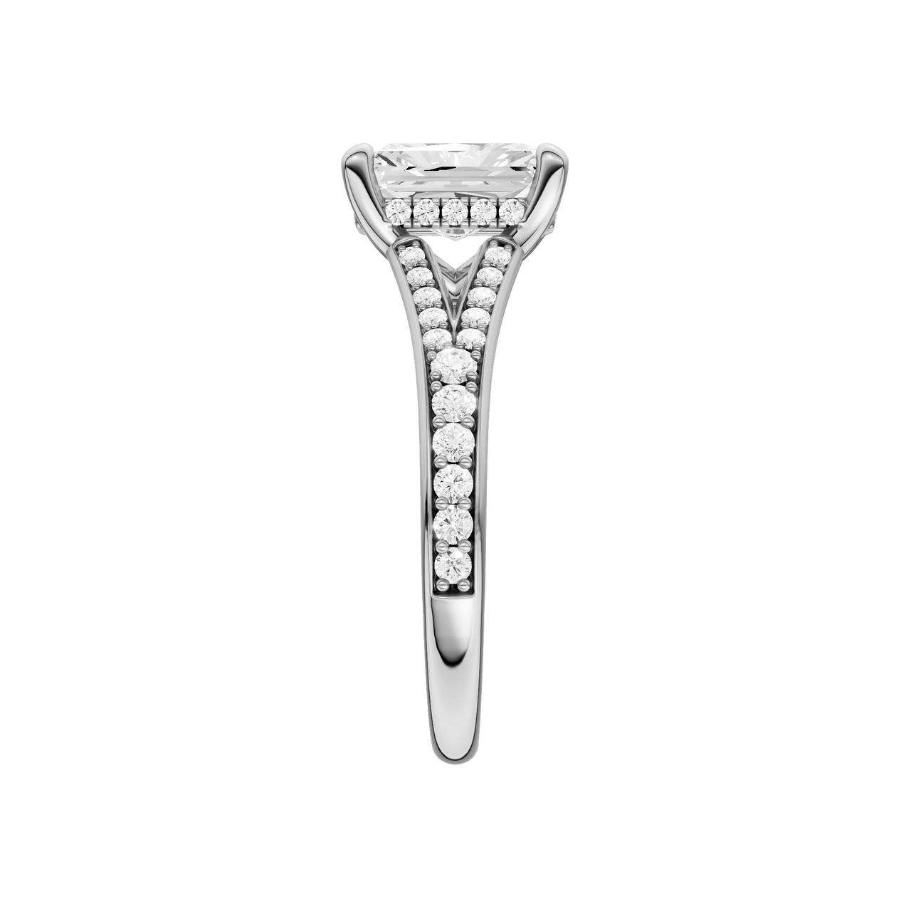 A side view of the Radiant cut diamond engagement ring in 14k white gold with a diamond channel band and split setting
