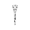 A side view of the Round cut diamond engagement ring in platinum gold with a channel band and hidden halo setting