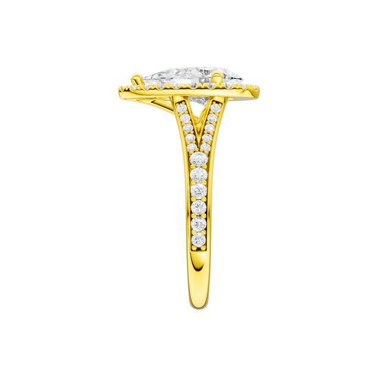A side view of the Pear cut diamond engagement ring in 14k yellow gold with a diamond channel band and split setting