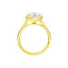A profile view of the Pear cut diamond engagement ring in 14k yellow gold with a diamond channel band and split setting