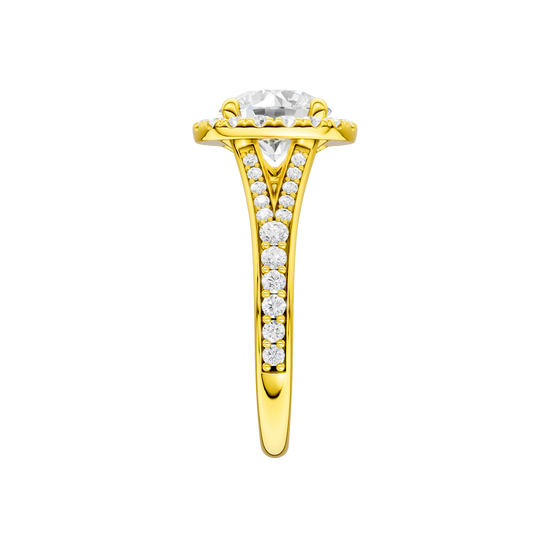 A side view of the Round cut diamond engagement ring in 14k yellow gold with a diamond channel band and split setting