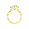 A profile view of the Round cut diamond engagement ring in 14k yellow gold with a diamond channel band and split setting