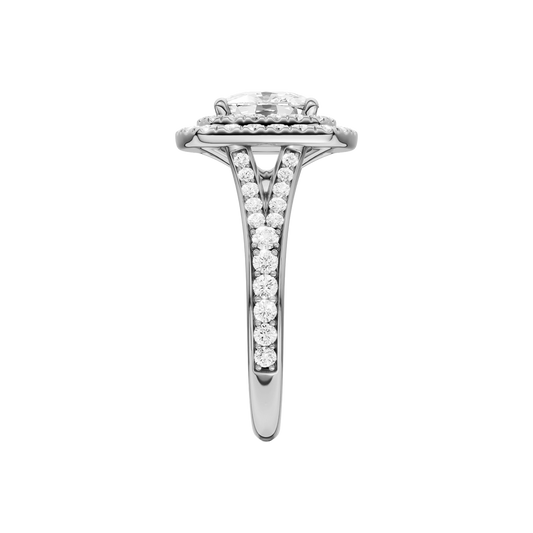 A side view of the Elongated Cushion cut diamond engagement ring in 14k white gold  with a channel band and double halo setting
