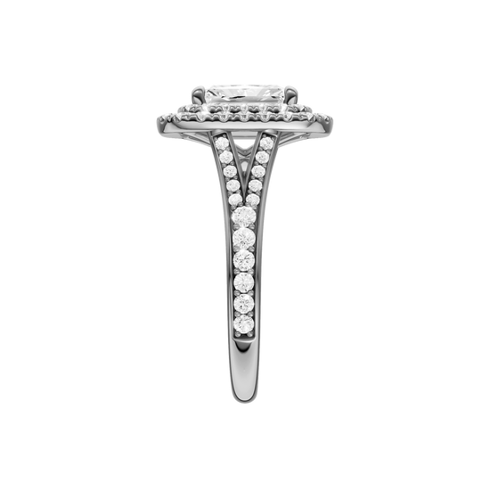 A side view of the Radiant cut diamond engagement ring in 14k white gold with a channel band and cathedral setting