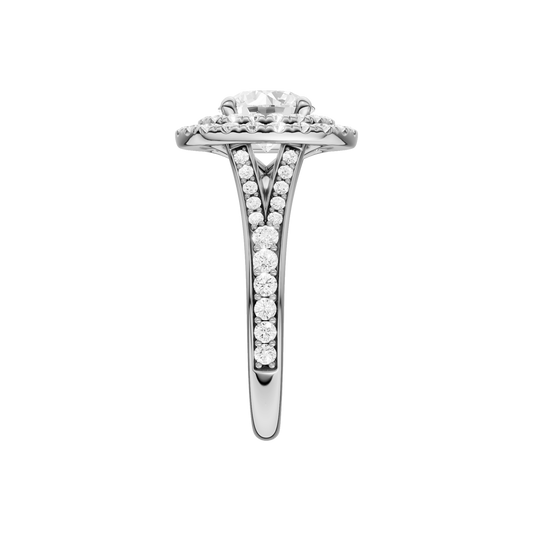 A side view of the Round cut diamond engagement ring in 14k white gold with a channel band and cathedral setting