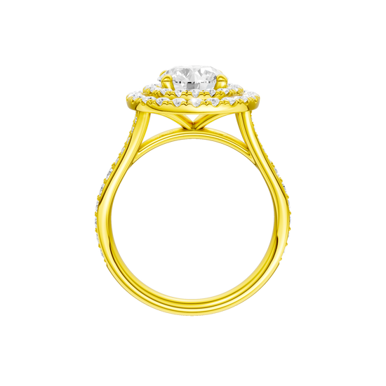 A profile view of the Round cut diamond engagement ring in 14k yellow gold with a channel band and cathedral setting