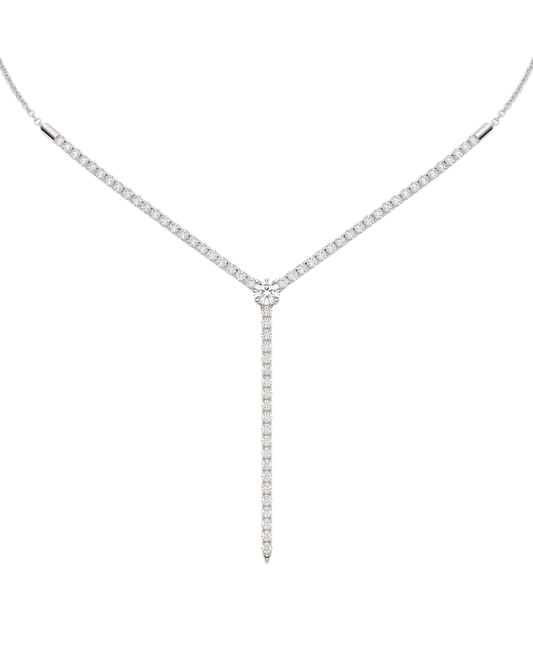 A close-up of the delicate 14K white gold diamond drop necklace (Valletta Strand) and the subtle diamond bar pendant.