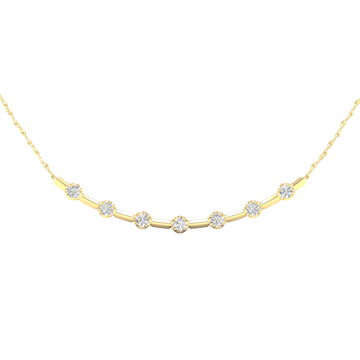Close-up view of round white diamonds set in a yellow gold station necklace, highlighting diamond brilliance, setting detail, and polished gold finish.