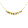 Front view of a delicate graduated emerald-cut diamond necklace in yellow gold, featuring smaller step-cut diamonds arranged in a soft curved silhouette.
