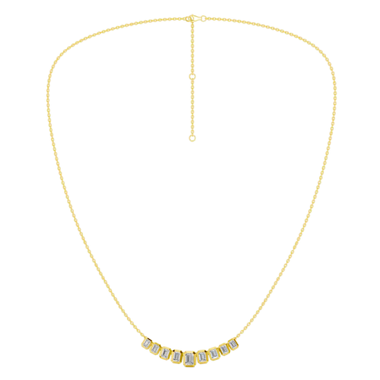 Zoomed out front view of a delicate graduated emerald-cut diamond necklace in yellow gold, featuring smaller step-cut diamonds arranged in a soft curved silhouette.
