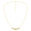 Zoomed out front view of a delicate graduated emerald-cut diamond necklace in yellow gold, featuring smaller step-cut diamonds arranged in a soft curved silhouette.
