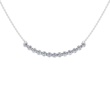 Up close front view of a white gold necklace featuring round white diamonds set along a gently curved design on a delicate chain.