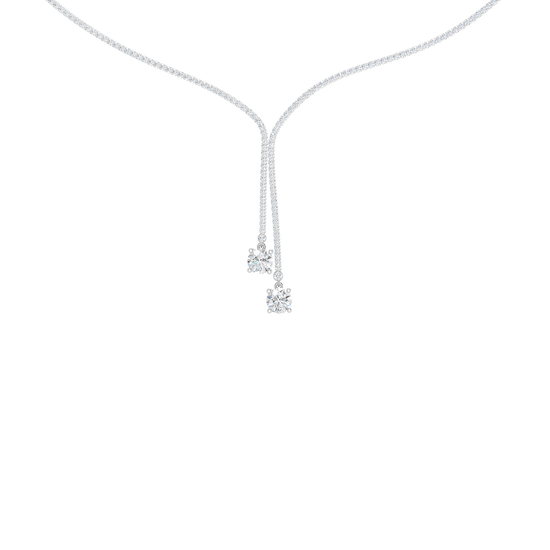 A close-up of the delicate 14K white gold diamond lariat Y necklace (Versailles Plunge) on a light background.