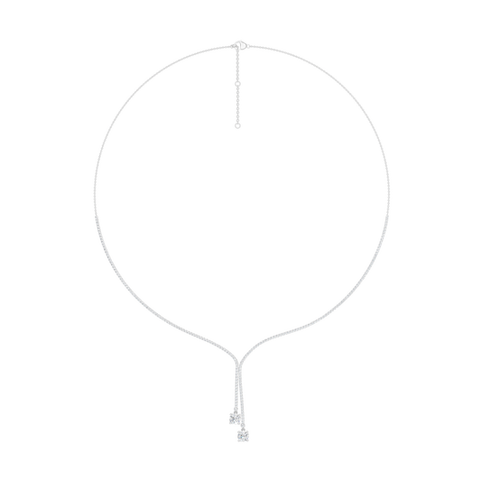 A top-down view of the 14K white gold diamond lariat Y-necklace (Versailles Plunge), highlighting the adjustable chain and deep diamond drop.