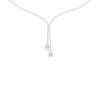 A close-up of the delicate 14K yellow gold diamond lariat Y necklace (Versailles Plunge) on a light background.