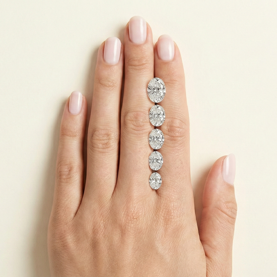 Diamond carat sizes on a hand