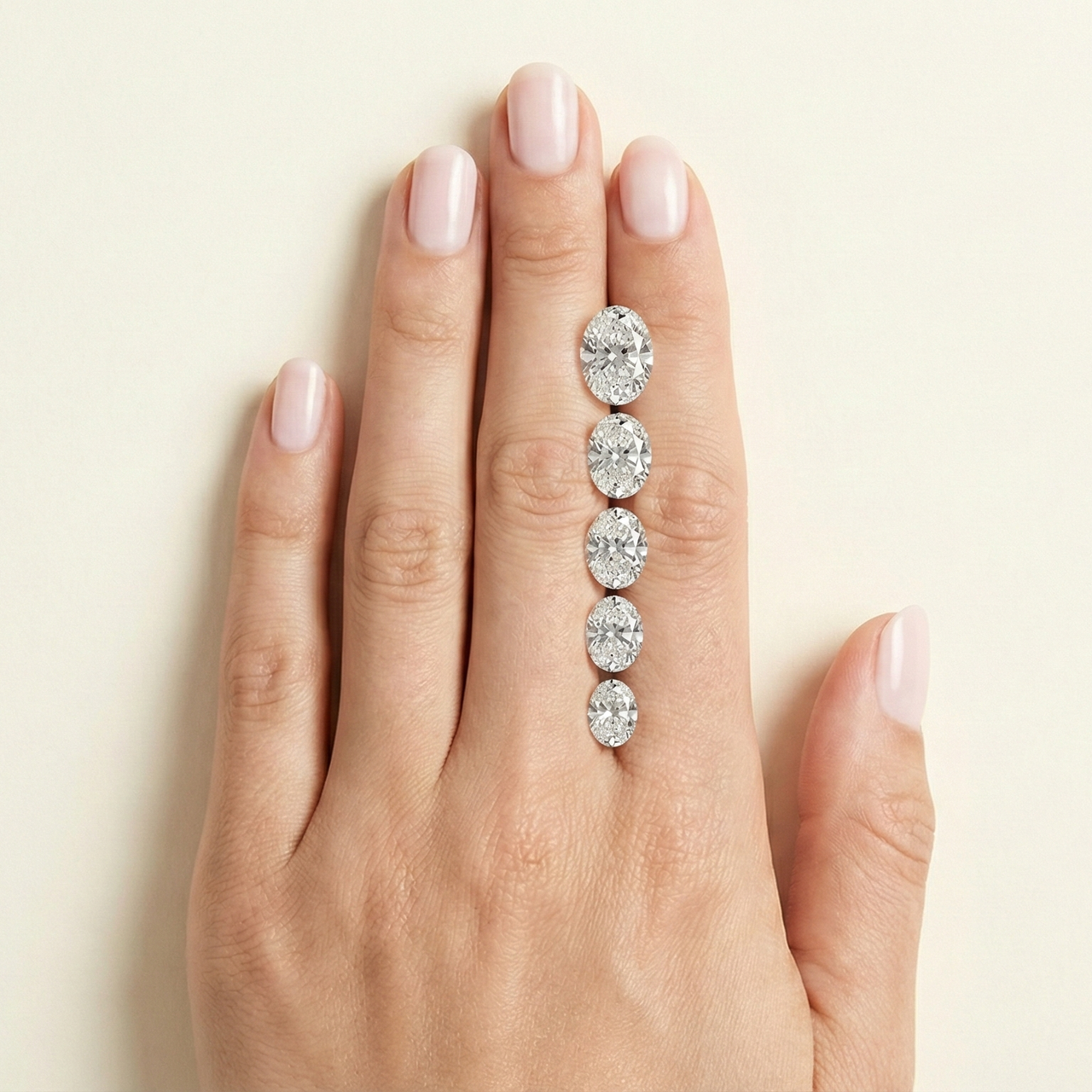 Diamond carat sizes on a hand