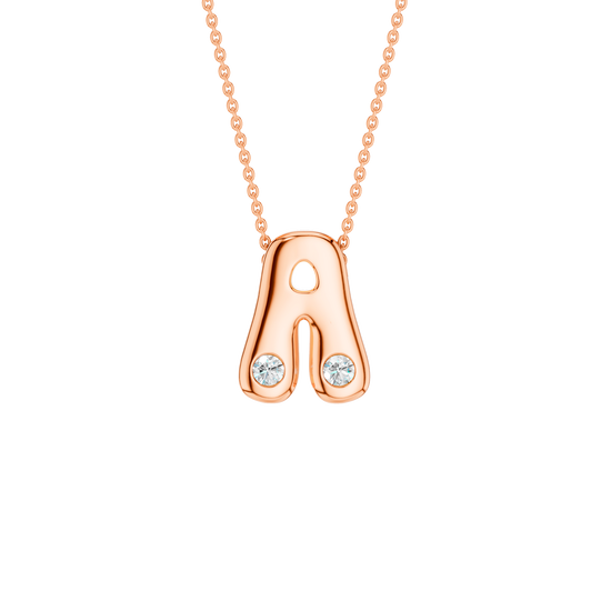 A high-polish 14k rose gold initial pendant by Amorati featuring star and geometric insets with shimmering round-cut lab-grown diamonds. Amorati’s signature F O U R T E E N T H Collection