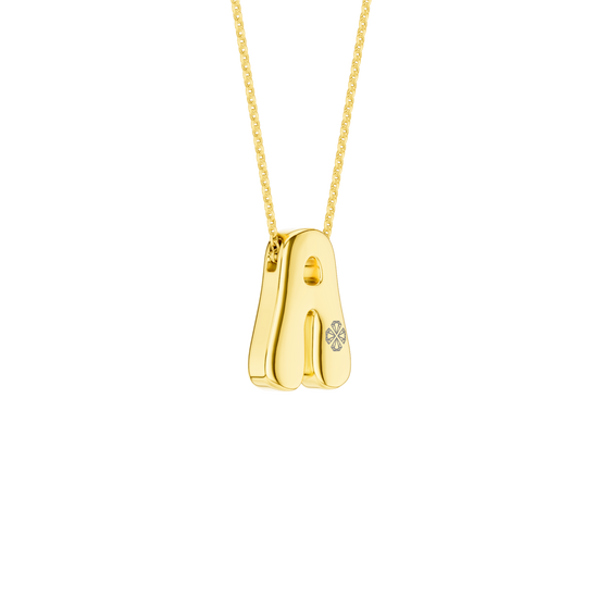 A high-polish 14k yellow gold initial pendant by Amorati featuring star and geometric insets with shimmering round-cut lab-grown diamonds. Amorati’s signature F O U R T E E N T H Collection
