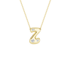 A product shot of a yellow gold necklace on a dark transparent background. The fine cable chain is attached to either side of a smooth, bubble-font letter 'Z' pendant. The gold 'Z' is embellished with three sparkling, flush-set round diamonds: one on the top curve and two varying in size along the bottom curve.