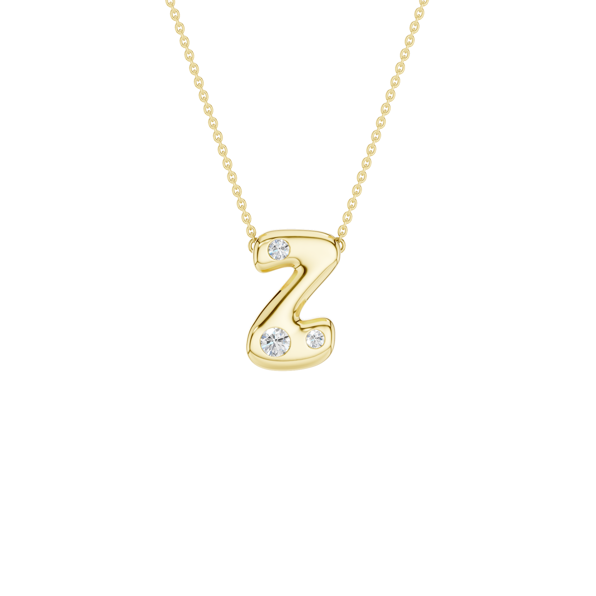 A product shot of a yellow gold necklace on a dark transparent background. The fine cable chain is attached to either side of a smooth, bubble-font letter 'Z' pendant. The gold 'Z' is embellished with three sparkling, flush-set round diamonds: one on the top curve and two varying in size along the bottom curve.