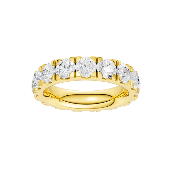 A magnificent 14k yellow gold eternity band featuring a continuous circle of 4.0 total carats of brilliant round-cut lab-grown diamonds