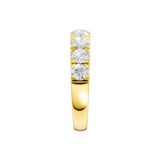 A sleek 14k yellow gold wedding band featuring 1.5 total carats of round-cut lab-grown diamonds in a secure channel-set 2/3 eternity style.