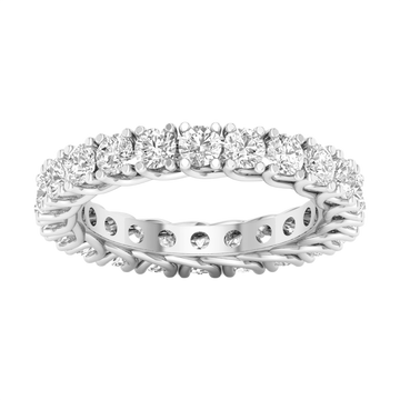 A brilliant 14k white gold eternity ring showcasing a continuous circle of premium round-cut diamonds in a modern twist-prong setting.