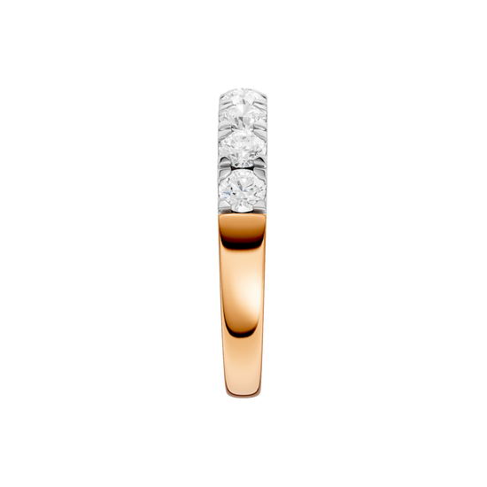 A side-profile view of a 14K rose gold ring, showing the elevated setting of the diamonds.