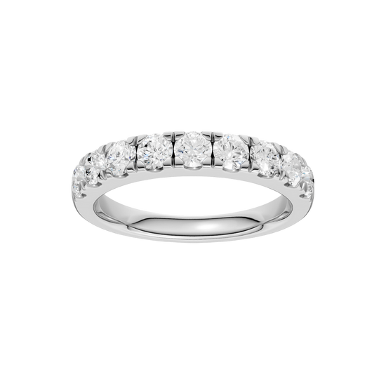 A top-down view of a 14K white gold band ring with a continuous line of brilliant rectangular diamonds.