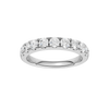 A top-down view of a 14K white gold band ring with a continuous line of brilliant rectangular diamonds.
