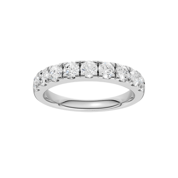 A top-down view of a 14K white gold band ring with a continuous line of brilliant rectangular diamonds.