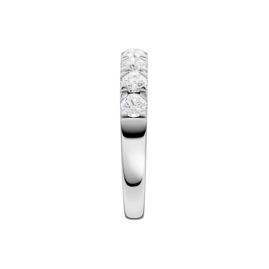 A side-profile view of a 14K white gold ring, showing the elevated setting of the diamonds.