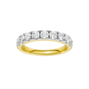 A top-down view of a 14K yellow gold band ring with a continuous line of brilliant rectangular diamonds.