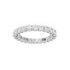 A top-down view of a 14K white gold eternity band with a continuous line of brilliant oval jewels.