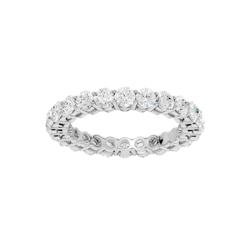A top-down view of a 14K white gold eternity band with a continuous line of brilliant oval jewels.