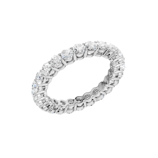 An angled view of a 14K white gold eternity band, highlighting the continuous sparkle of the oval jewels.