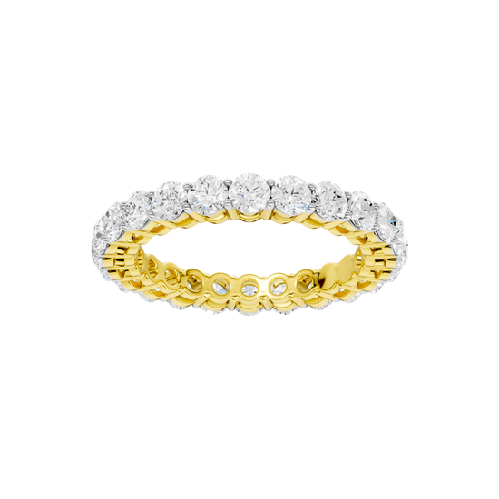A top-down view of a 14K yellow gold eternity band with a continuous line of brilliant oval jewels.