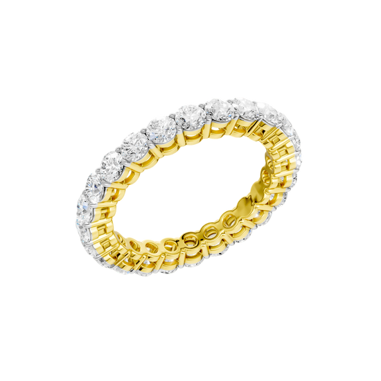 An angled view of a 14K yellow gold eternity band, highlighting the continuous sparkle of the oval jewels.
