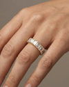 A breathtaking 14k yellow gold 2/3 eternity wedding band featuring 3.0 total carats of shimmering emerald-cut lab-grown diamonds on hand.