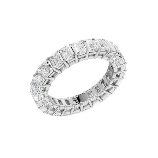 An angled view of a 14K white gold eternity band, showcasing the impressive brilliance of the rectangular jewels.