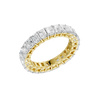 An angled view of a 14K yellow gold eternity band, showcasing the impressive brilliance of the rectangular jewels.