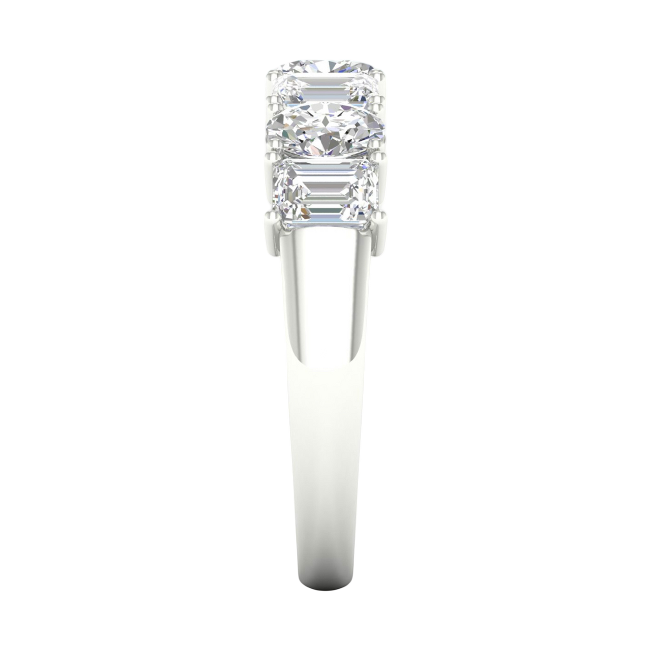 A side-profile view of a 14K white gold eternity ring, showing the secure setting and the large emerald-cut diamonds.