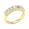 An angled view of a 14K yellow gold eternity ring, showcasing the magnificent line of diamonds.