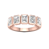 A top-down view of a 14K rose gold ring with a series of horizontal, rectangular diamonds.