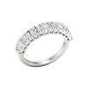 An angled view of a 14K white gold eternity ring, showcasing the brilliant line of round diamonds.
