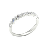 An angled view of a 14K white gold band ring, showcasing the brilliant, alternating pattern of diamonds.
